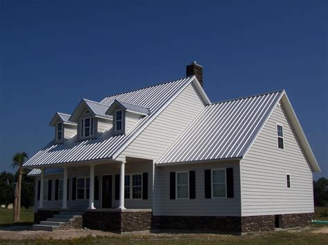 pictures of white houses with metal roofs|white house with galvalume roof.